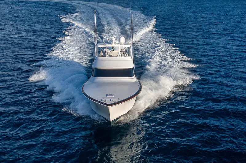 South Jersey Yacht Sales Demo Boat Yacht Photos Pics 2025 Viking 64 Convertible yacht cruising on open water.