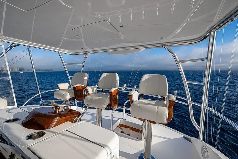 South Jersey Yacht Sales Demo Boat Yacht Photos Pics Luxury seating on 2025 Viking 64 Convertible yacht, ocean view.