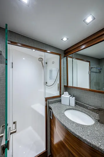 South Jersey Yacht Sales Demo Boat Yacht Photos Pics Luxurious bathroom in 2025 Viking 64 Convertible yacht with modern fixtures and elegant design.