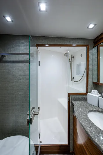 South Jersey Yacht Sales Demo Boat Yacht Photos Pics Luxurious bathroom in 2025 Viking 64 Convertible yacht with modern fixtures and elegant design.