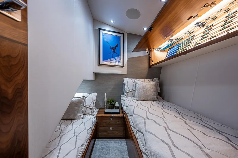 South Jersey Yacht Sales Demo Boat Yacht Photos Pics Luxurious 2025 Viking 64 Convertible cabin with twin beds and modern decor.