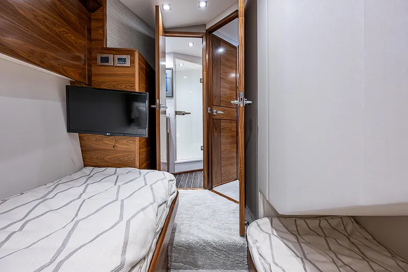 South Jersey Yacht Sales Demo Boat Yacht Photos Pics Interior of 2025 Viking 64 Convertible yacht with cozy cabin and modern amenities.