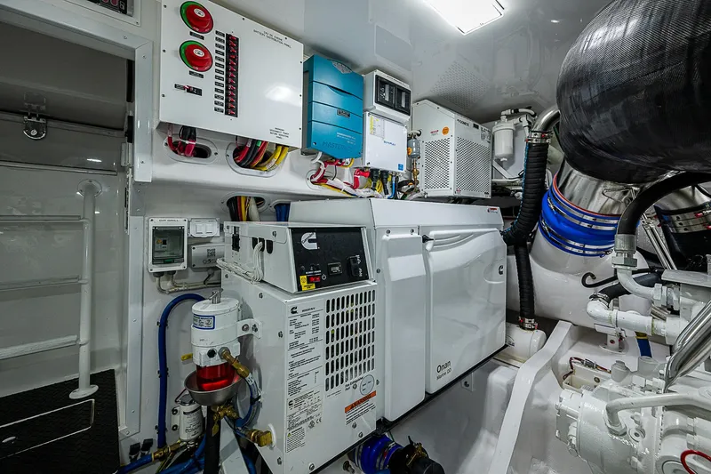 South Jersey Yacht Sales Demo Boat Yacht Photos Pics Engine room of 2025 Viking 64 Convertible yacht with advanced equipment and wiring.