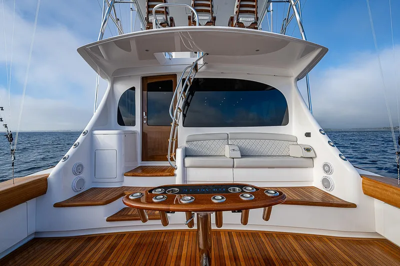 South Jersey Yacht Sales Demo Boat Yacht Photos Pics 2025 Viking 64 Convertible yacht with elegant deck and seating area.