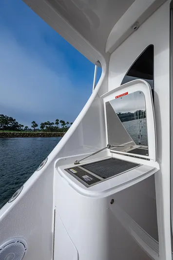 South Jersey Yacht Sales Demo Boat Yacht Photos Pics 2025 Viking 64 Convertible yacht deck with scenic water view.