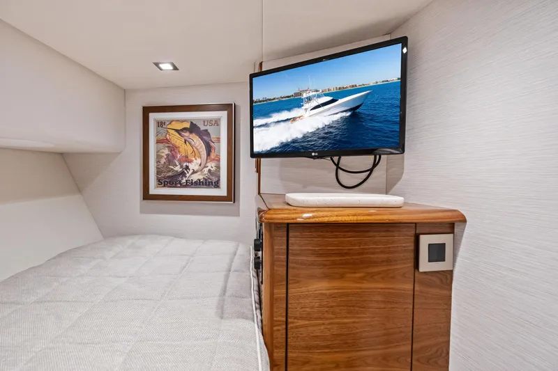  Yacht Photos Pics Interior of 2025 Viking 64 Convertible yacht with TV and sport fishing decor.