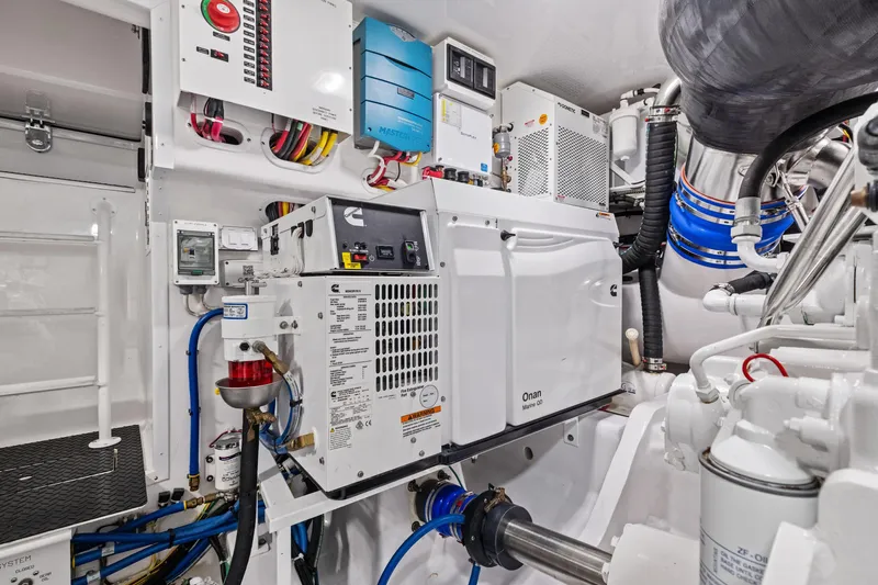  Yacht Photos Pics Engine room of 2025 Viking 64 Convertible yacht with advanced equipment and systems.