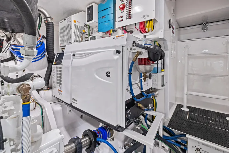  Yacht Photos Pics Engine room of 2025 Viking 64 Convertible yacht, featuring advanced mechanical systems.