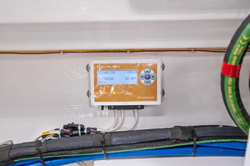  Yacht Photos Pics Control panel in 2025 Viking 64 Convertible yacht engine room, displaying ElectroSea Clearline system.