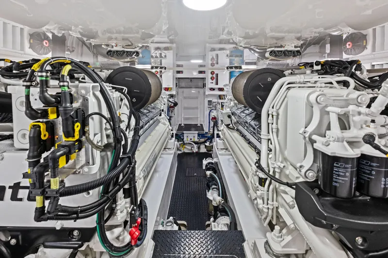  Yacht Photos Pics Engine room of 2025 Viking 64 Convertible yacht, showcasing advanced machinery and components.