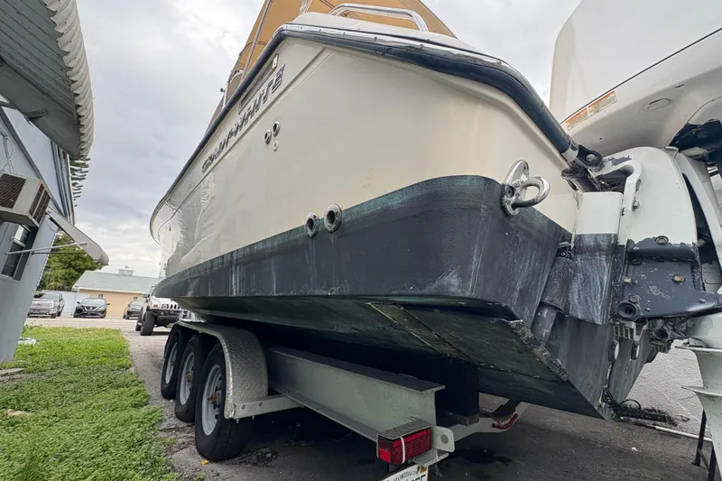  Yacht Photos Pics 2006 Grady-White Express 330 boat on trailer, side view, parked outdoors.