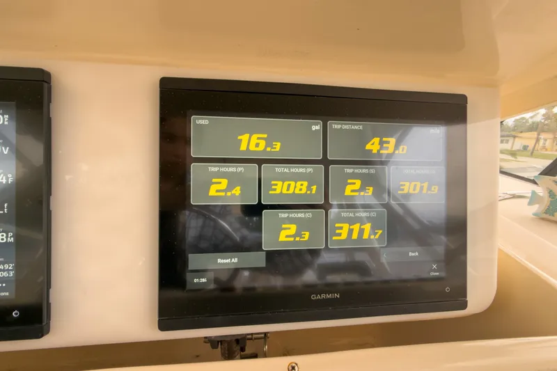  Yacht Photos Pics Garmin display on 2006 Grady-White Express 330 showing trip data and fuel usage.