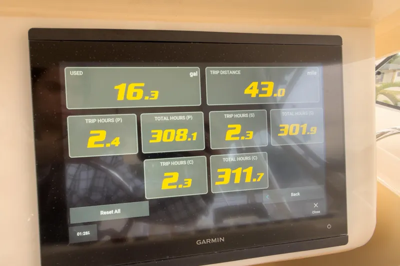  Yacht Photos Pics Garmin display showing fuel usage and trip data on 2006 Grady-White Express 330 boat.