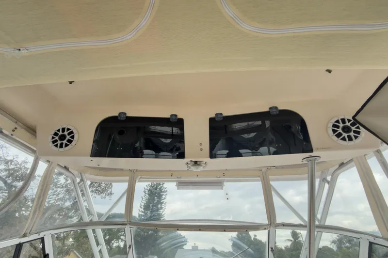  Yacht Photos Pics 2006 Grady-White Express 330 boat interior with speakers and windows.