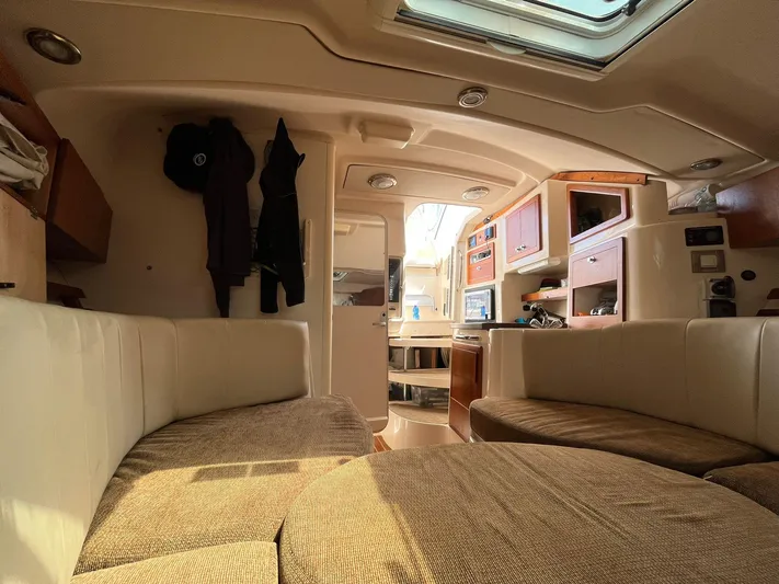  Yacht Photos Pics Interior of 2010 Grady-White Express 305 boat, featuring cozy seating and modern amenities.