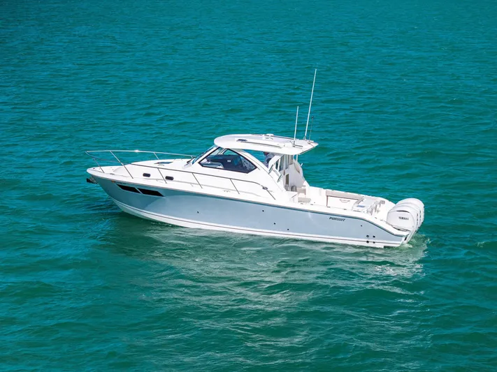 No Name Yacht Photos Pics 2025 Pursuit OS 355 Offshore boat cruising on clear blue water.