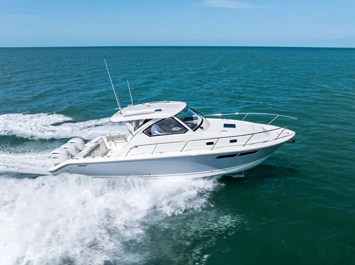 No Name Yacht Photos Pics 2025 Pursuit OS 355 Offshore boat cruising on open sea.