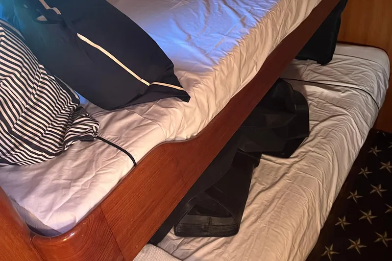 Apaiser Yacht Photos Pics Bunk beds with striped pillows in 2005 Ocean Alexander 52 Sedan yacht interior.