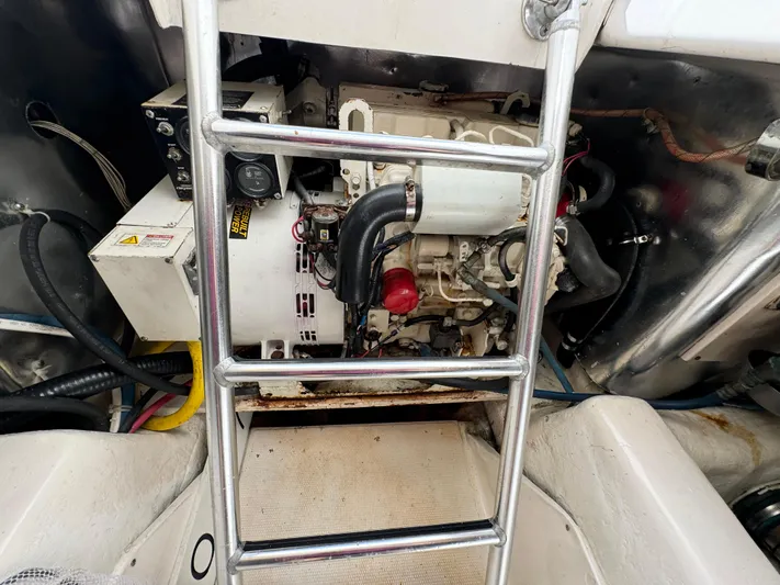  Yacht Photos Pics Engine compartment of a 2005 Ocean Yachts 46 Super Sport with visible ladder.
