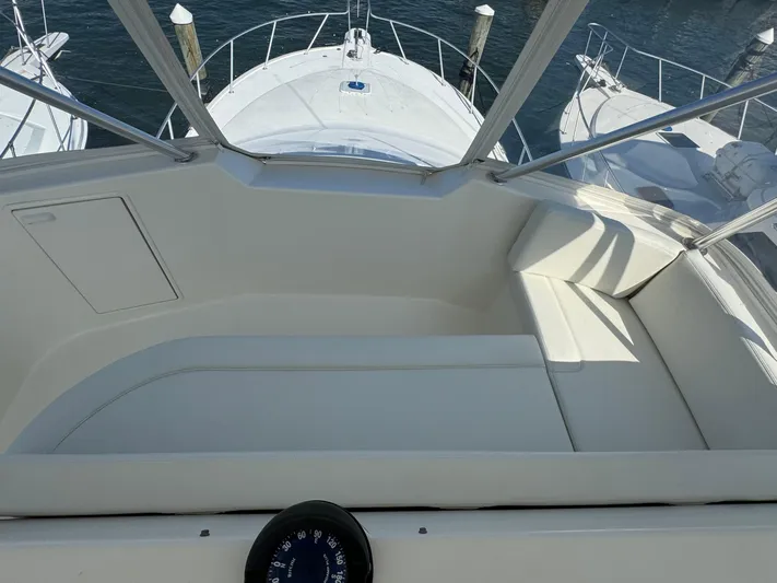  Yacht Photos Pics 2005 Ocean Yachts 46 Super Sport yacht cockpit with seating and ocean view.