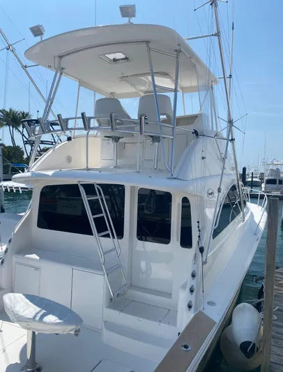  Yacht Photos Pics 2005 Ocean Yachts 46 Super Sport boat docked at marina, rear view.