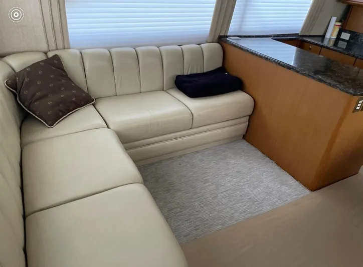  Yacht Photos Pics Interior of 2005 Ocean Yachts 46 Super Sport with beige leather seating and granite countertop.
