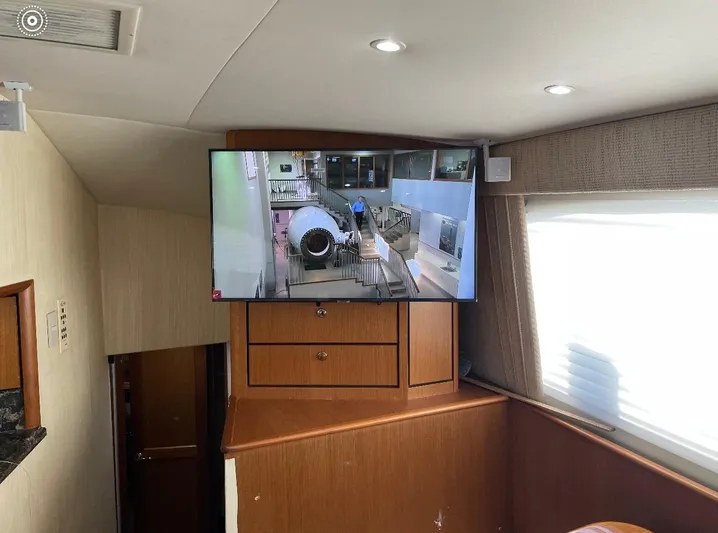  Yacht Photos Pics Interior of 2005 Ocean Yachts 46 Super Sport with wall-mounted TV.