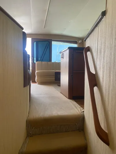  Yacht Photos Pics Interior view of 2005 Ocean Yachts 46 Super Sport, featuring a cozy seating area.