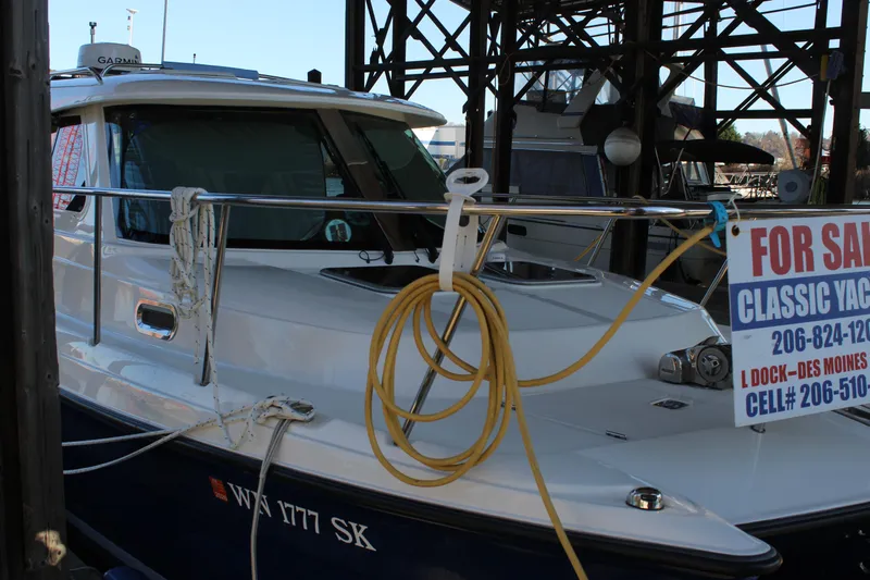  Yacht Photos Pics 2016 Aspen B100 yacht for sale at dock, with contact information displayed.