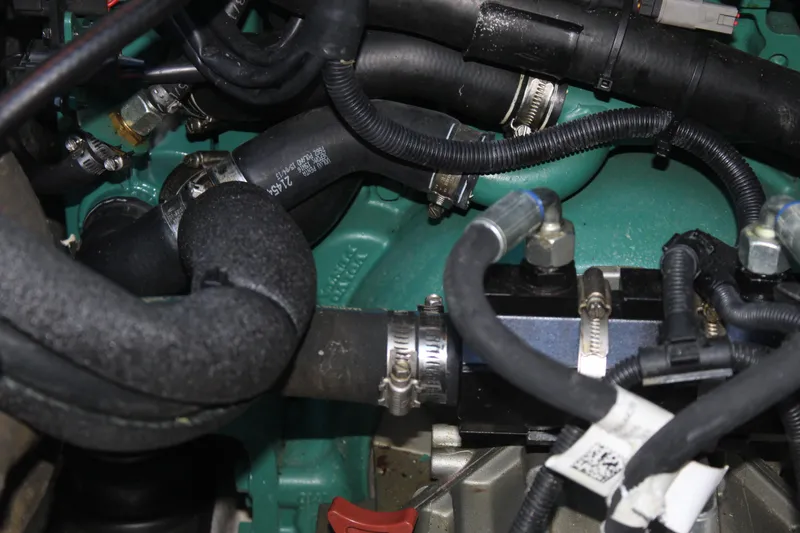  Yacht Photos Pics Close-up of Aspen B100 2016 engine components with hoses and clamps.