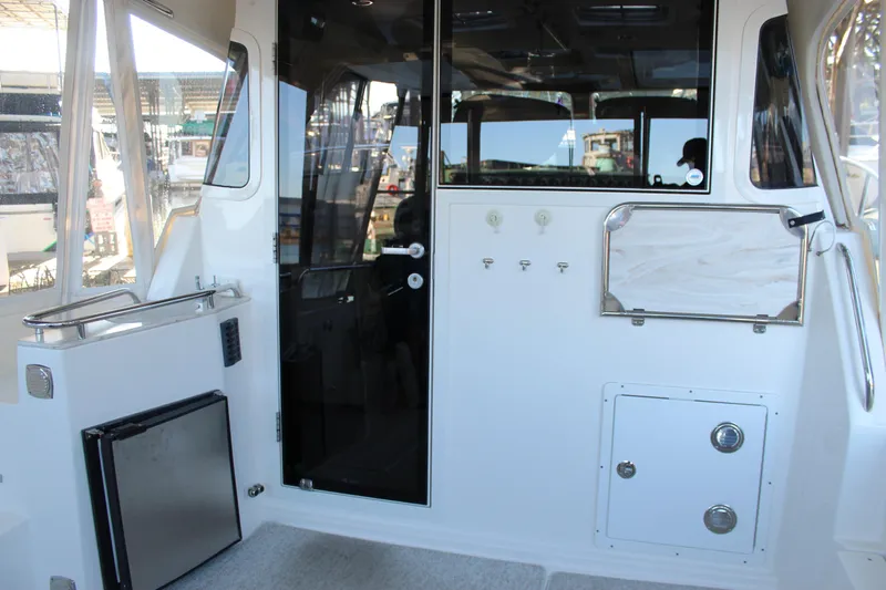  Yacht Photos Pics Interior view of a 2016 Aspen B100 boat, featuring sleek design and modern amenities.