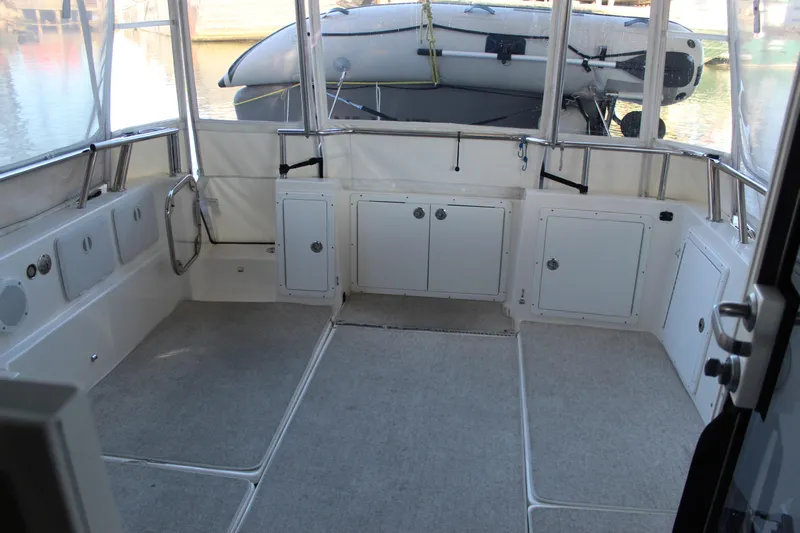  Yacht Photos Pics Spacious interior of 2016 Aspen B100 boat with storage compartments and clean design.