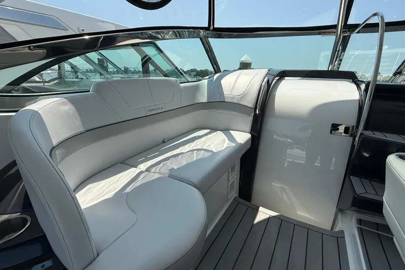  Yacht Photos Pics 2022 Formula 40 Performance Cruiser interior with sleek seating and modern design.
