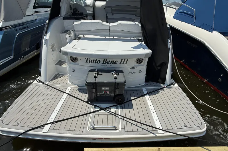  Yacht Photos Pics 2022 Formula 40 Performance Cruiser docked, featuring spacious deck and YETI cooler.
