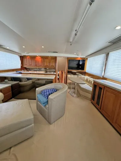  Yacht Photos Pics Luxurious interior of a 1998 Viking 58 Convertible yacht with modern furnishings.