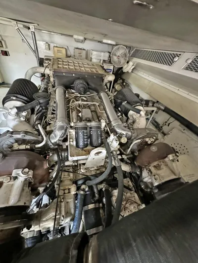  Yacht Photos Pics Engine room of a 1998 Viking 58 Convertible yacht showing detailed machinery.