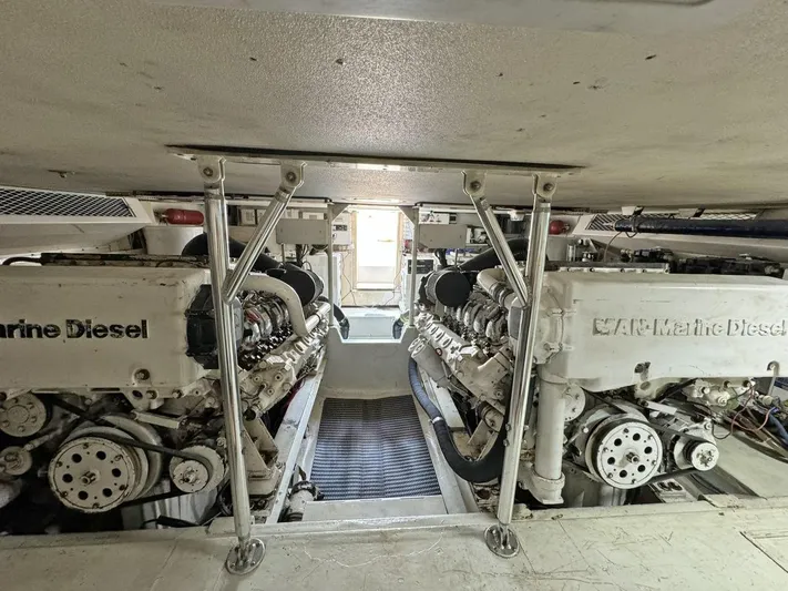  Yacht Photos Pics Engine room of a 1998 Viking 58 Convertible yacht with twin marine diesel engines.