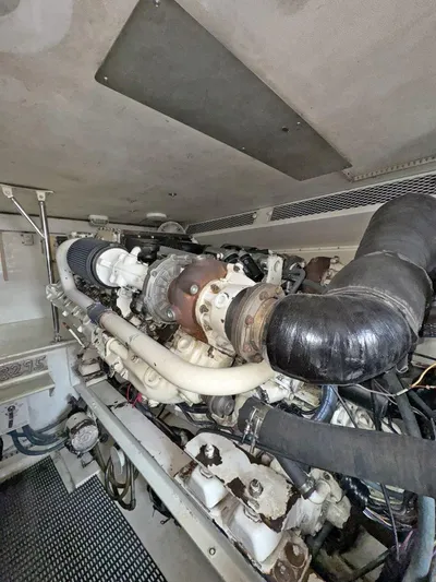  Yacht Photos Pics Engine room of a 1998 Viking 58 Convertible yacht showing detailed machinery.