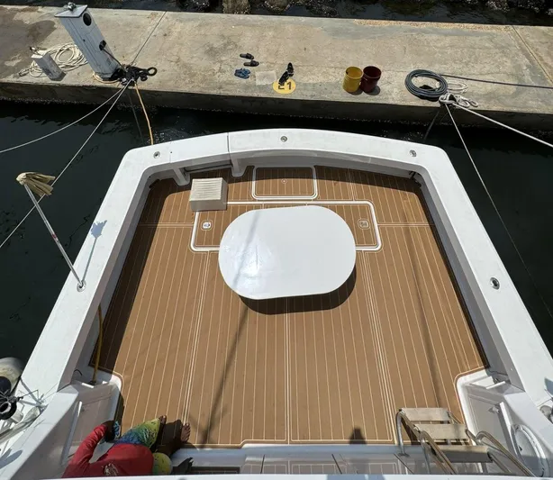  Yacht Photos Pics Top view of 1998 Viking 58 Convertible boat deck at dock.