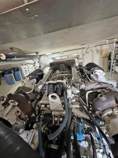  Yacht Photos Pics Engine room of a 1998 Viking 58 Convertible yacht showing detailed machinery.