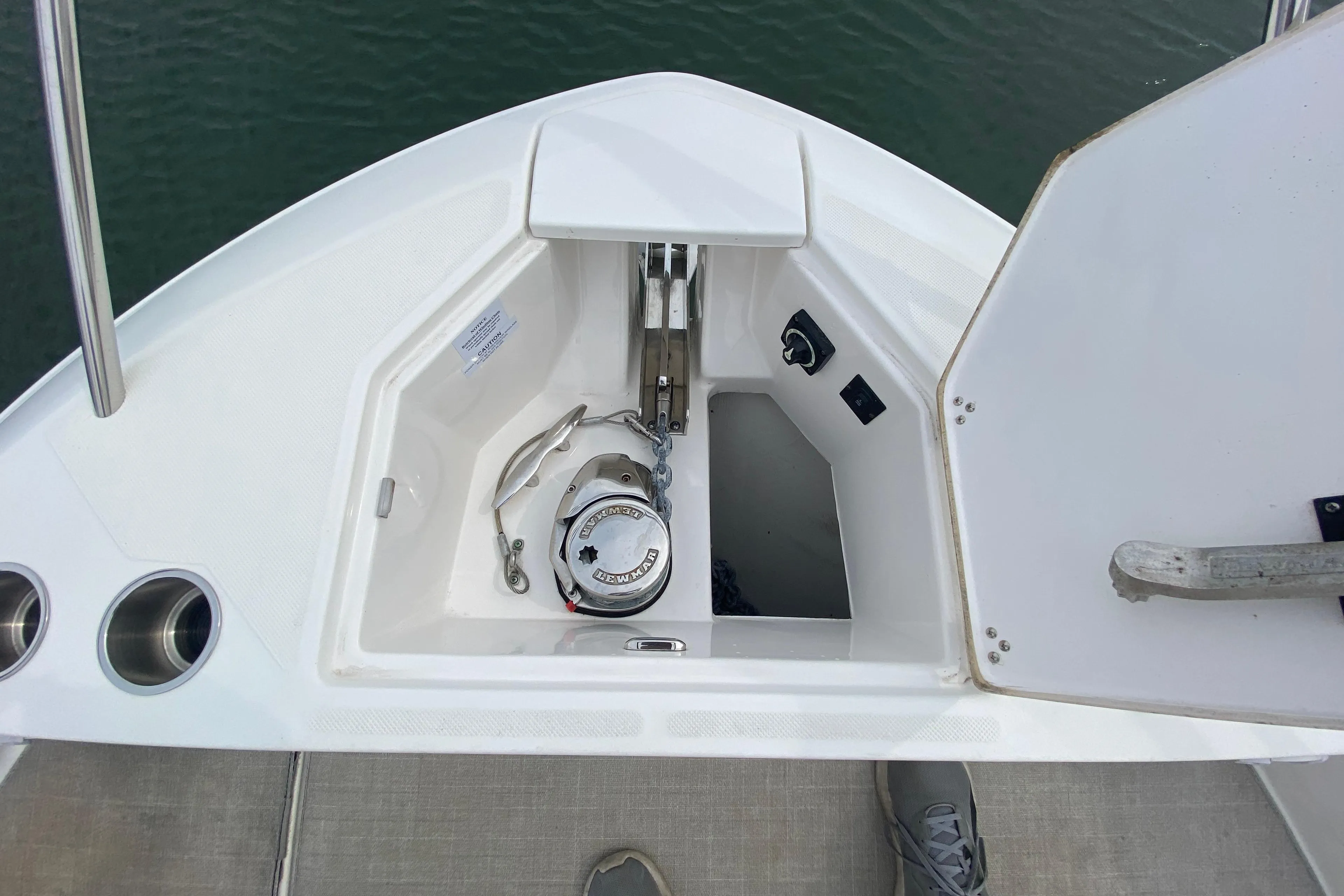 Anchor compartment of 2022 Regal 36 XO boat, featuring a windlass system.