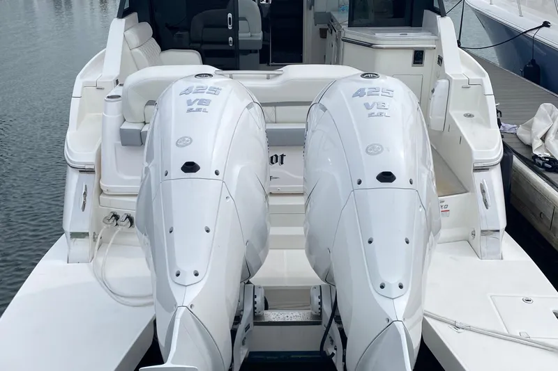 Camelot Yacht Photos Pics 2022 Regal 36 XO boat with twin 425 V8 engines docked at marina.