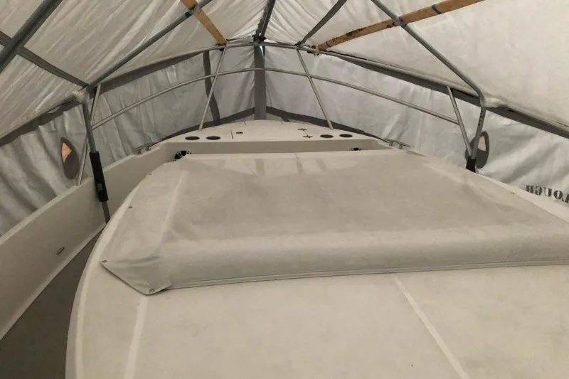 Camelot Yacht Photos Pics 2022 Regal 36 XO boat under protective cover in storage.