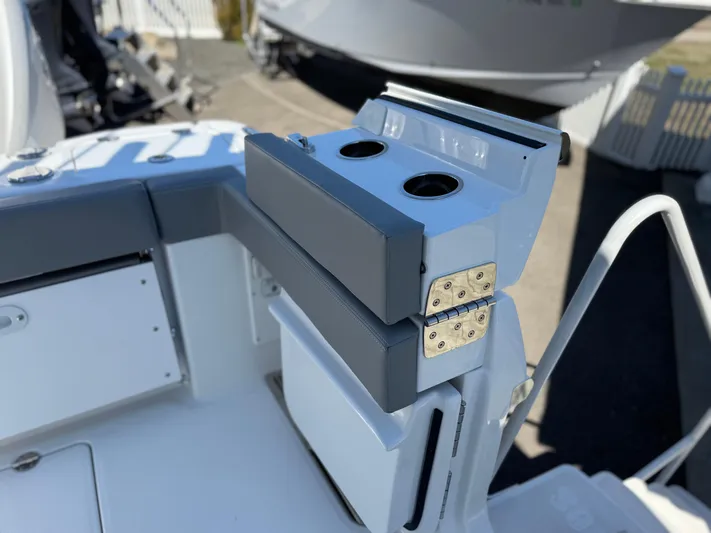  Yacht Photos Pics 2025 Everglades 285 Center Console boat with cup holders and storage compartment.