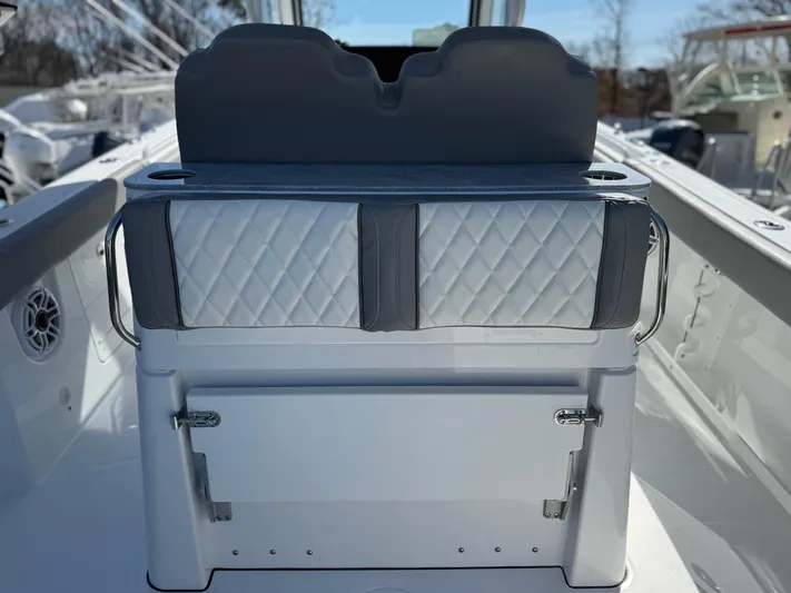  Yacht Photos Pics 2025 Everglades 285 Center Console boat interior with quilted seating and storage.