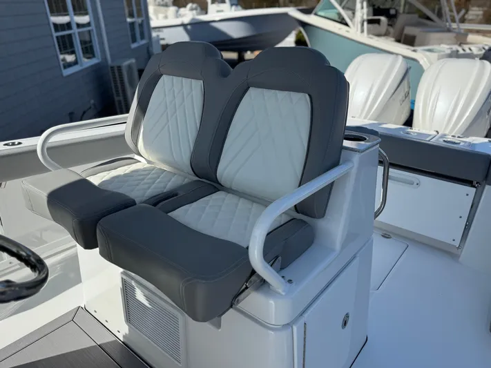  Yacht Photos Pics 2025 Everglades 285 Center Console boat seats with gray and white upholstery.