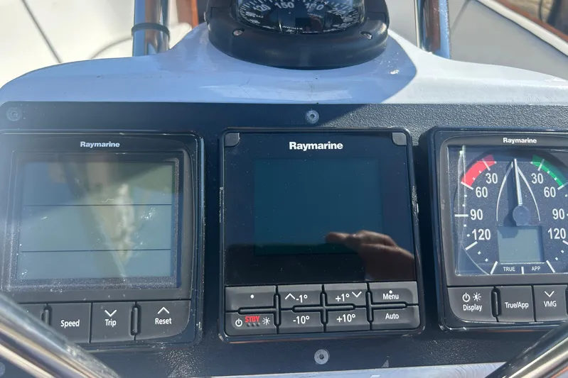  Yacht Photos Pics Cockpit instruments of a 2008 Alerion Express 33 sailboat, featuring Raymarine displays.