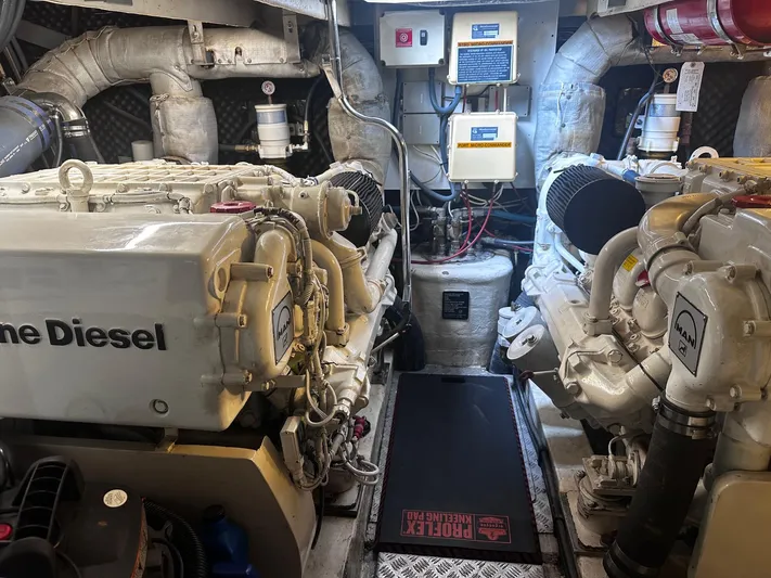 Hot Stuff Yacht Photos Pics Engine room of a 2000 Sunseeker Predator 56 yacht, featuring MAN diesel engines.