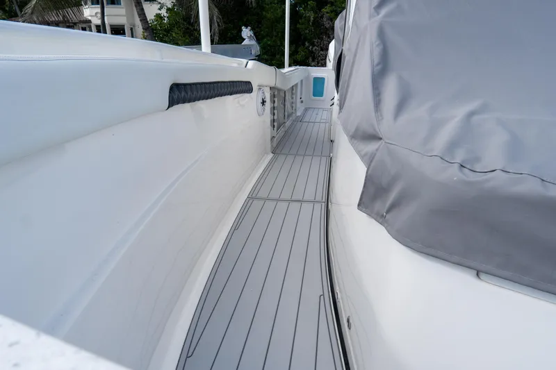  Yacht Photos Pics 2023 Tidewater 380 CC Adventure boat deck with sleek design and modern features.