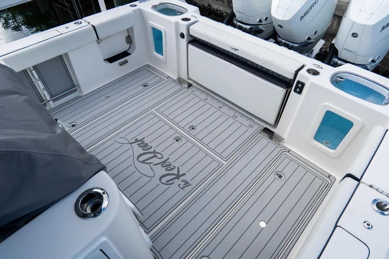  Yacht Photos Pics 2023 Tidewater 380 CC Adventure boat deck with sleek design and modern features.